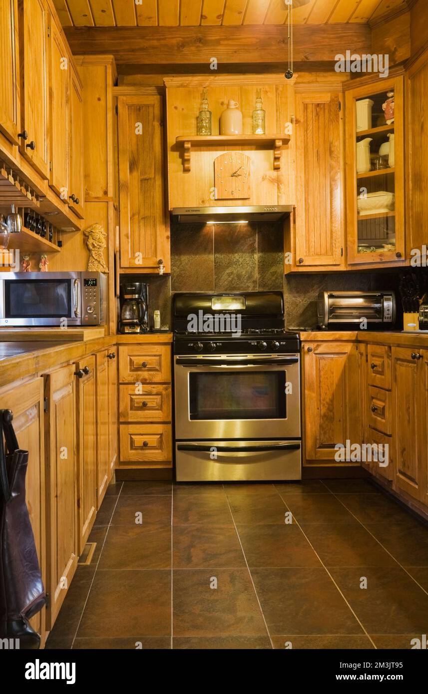 Wooden in kitchen with stainless steel appliances inside piece