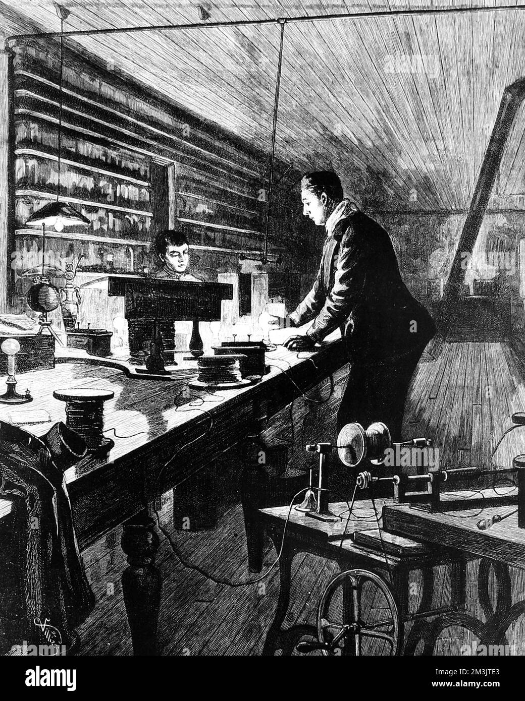 Sketch by Frederic Villiers showing Thomas Alva Edison (1847-1931) US inventor and physicist at work in his laboratory.  Edison was a prolific inventor and took out over 1000 patents, one of the most influential being the incandescent light bulb in 1879.     Date: 1880 Stock Photo