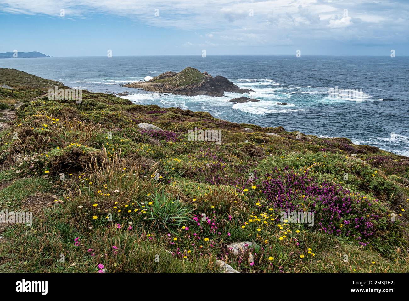 The cape of Tourinan in Muxia, Costa da Morte, Death Coast, Galicia, Spain.  These cliffs are the westernmost coast of the Spanish peninsular territory  Stock Photo - Alamy, image size:1300x956