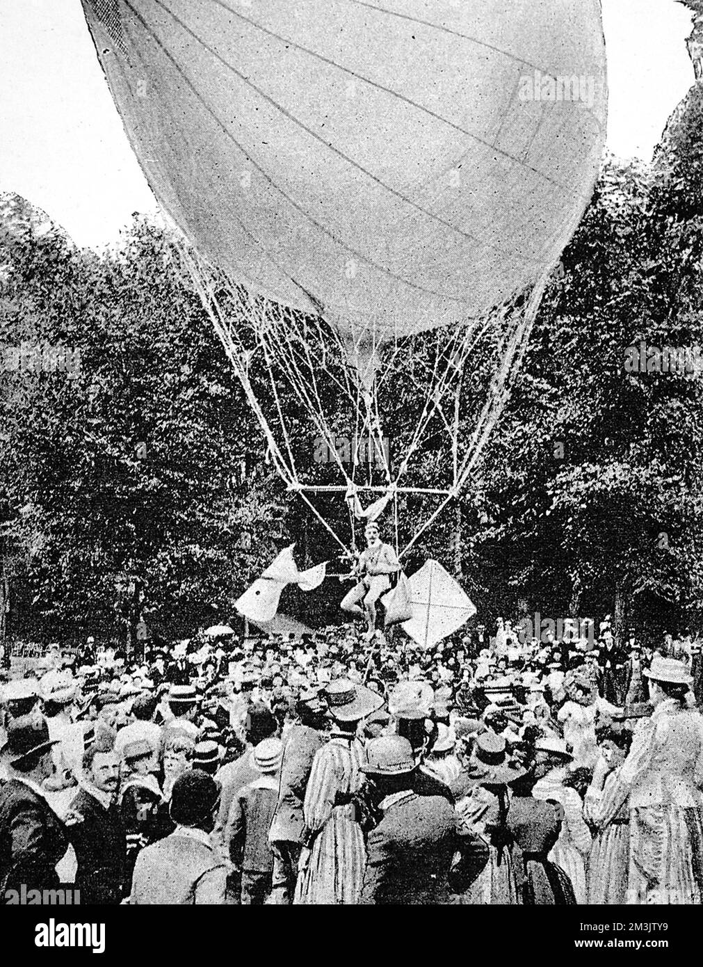Photograph of Professor Carl Myers' Air Bicycle being demonstrated at Congress Springs, Saratoga, 1891. The balloon above the rider was filled with hydrogen gas, whilst a pedal driven sail to control the direction and speed of travel.  This machine was reported to have attained a speed of ten miles an hour and a height of 15,000 feet.     Date: 1891 Stock Photo