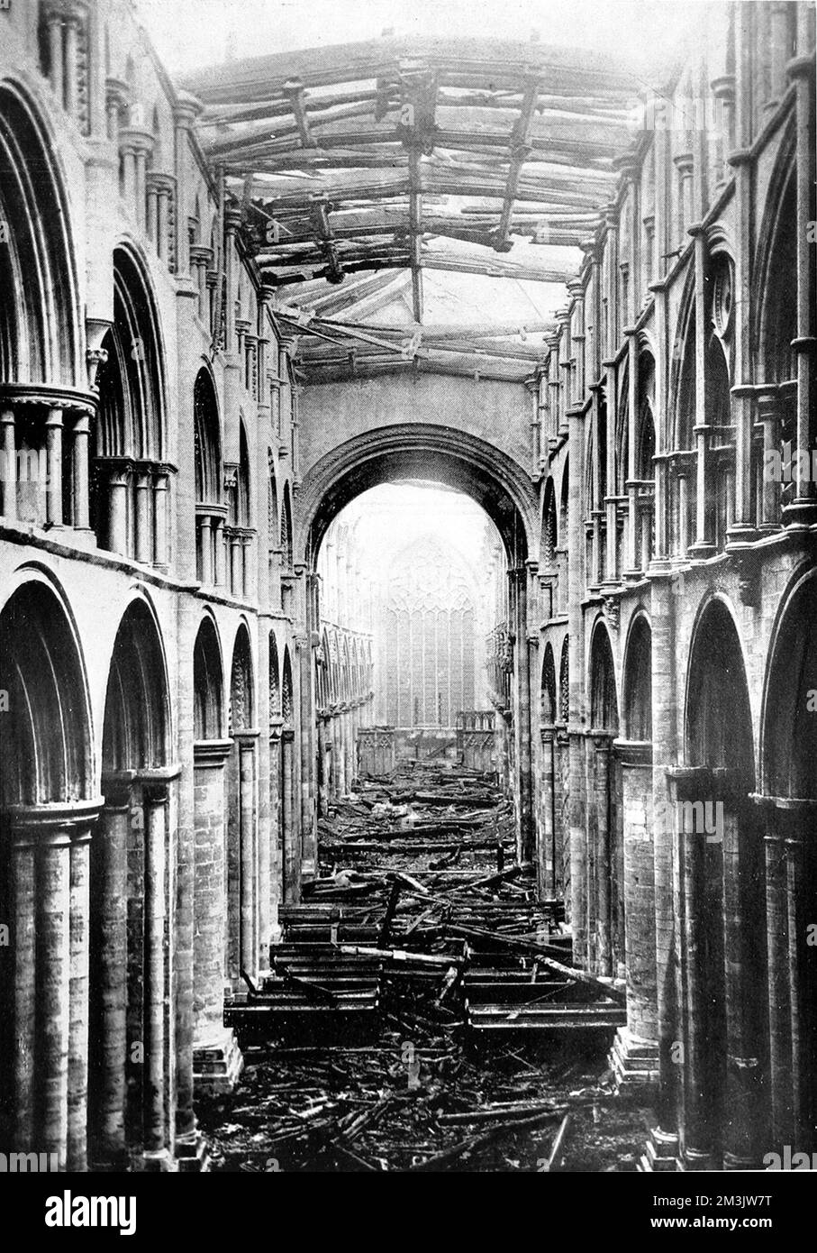 Nave of Selby Abbey taken after the fire of 20th October 1906. This 11th century Abbey, an extremely fine example of Norman architecture, was very badly damaged by the fire, which was believed to have started in a gas-engine which blew the organ. This organ had only been installed on the 28th September 1906.     Date: 1906 Stock Photo