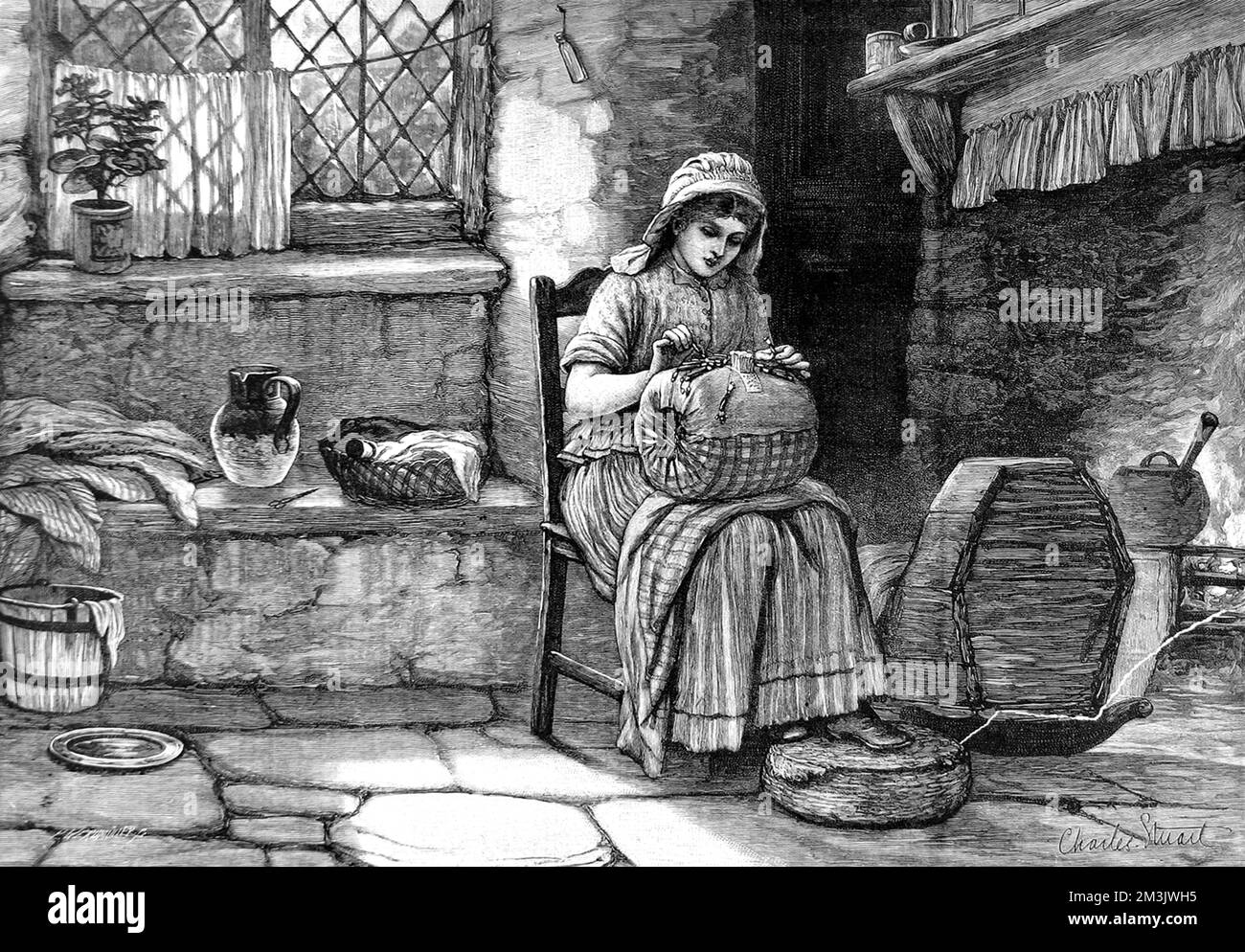 Lace-making was a typical cottage industry and could be carried out independently by women in their homes. The woman in the picture sits by the hearth in a cottage with a bolster-style pillow firmly stuffed with straw on her lap. She is interweaving bobbins in order to produce the lace. Lace-makers earned comparatively good wages, but only by working up to twelve hours a day, and consequently suffering poor health.  1878 Stock Photo