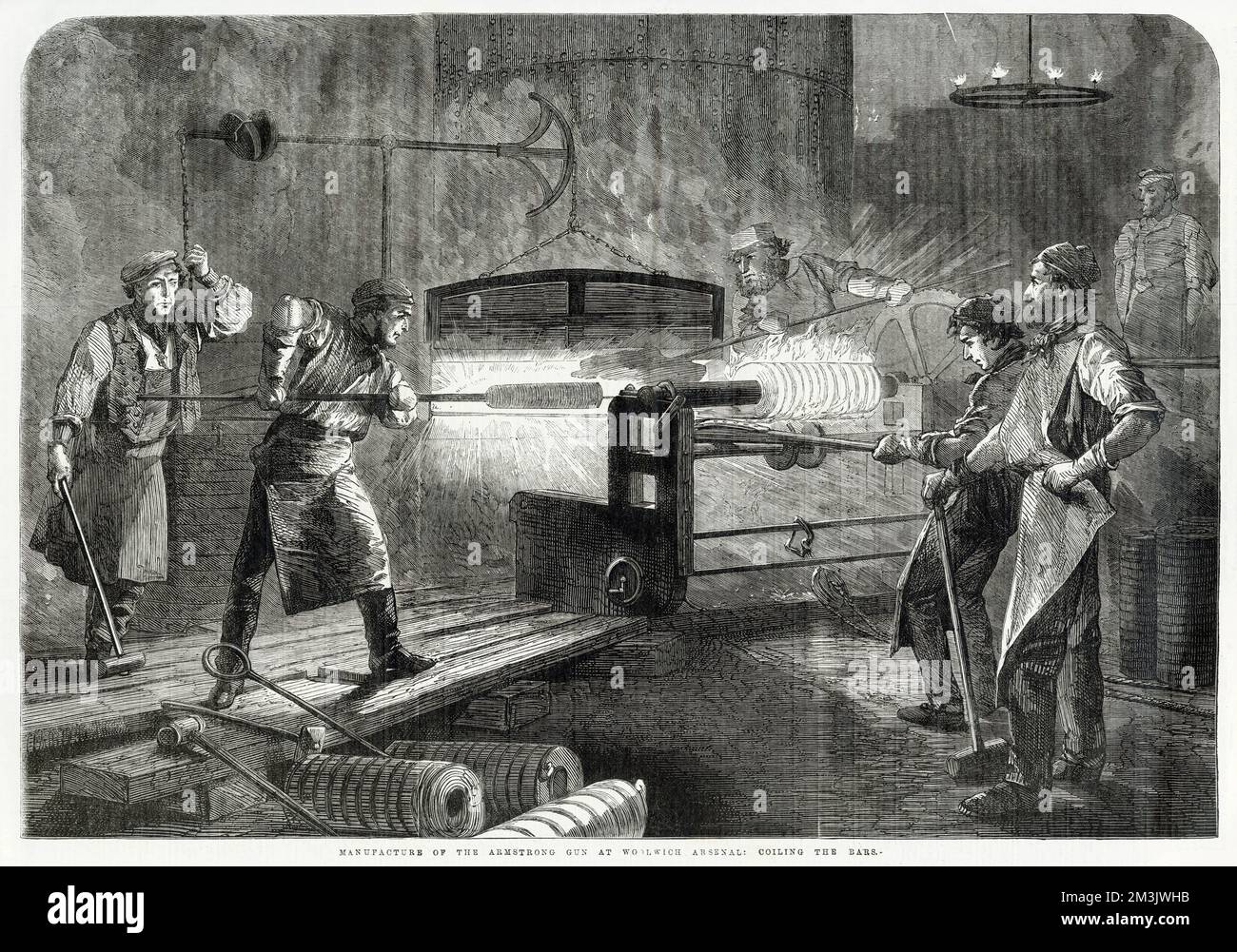 Scene in Woolwich Arsenal, London showing an armstrong gun being made. This gun was introduced into the British Army in 1859 and was one of the first practical breech loading field guns of the modern era. The gun could fire shrapnel, case shot or an explosive 11.56lb. shell and was considered highly accurate. Situated near the Royal Dockyard, Woolwich first changed from a storage depot to a munitions factory at the end of the 17th century. The Armstrong Rifle factory was opened around 1858. Stock Photo