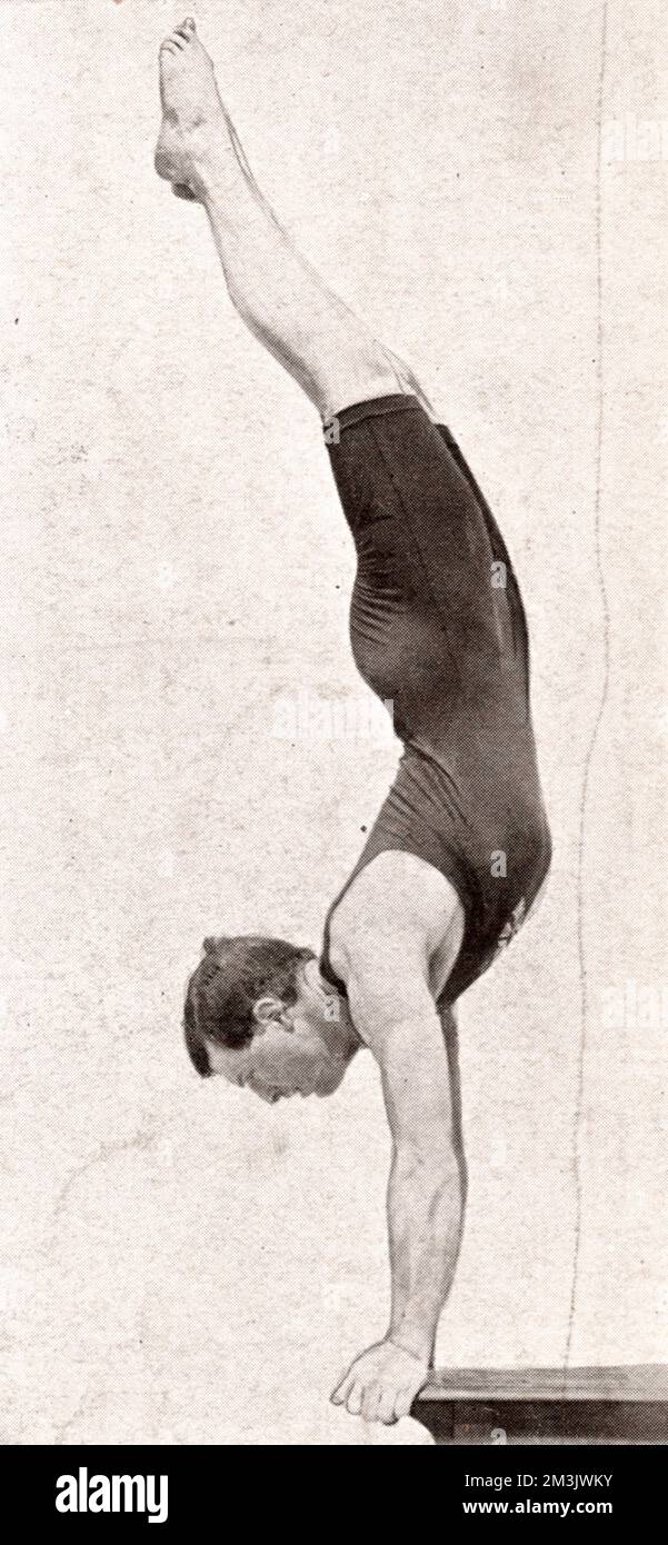 Clark of Great Britain performing a handspring dive at the 1906 Olympic Games in Athens.  The event was staged as a celebration of the tenth anniversary of the resumption of the Games and opened on May 22.     Though not official, they very important for the Olympic movement after the failure of the 1900 and 1904 Olympics.     Date: 1906 Stock Photo