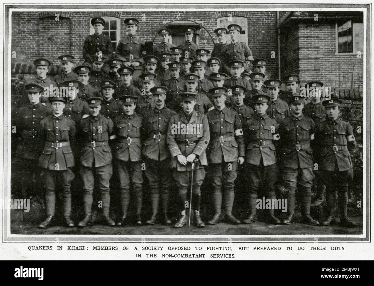 Many men refused to bear arms, for a variety of reasons. These men are Quakers and opposed to fighting on religious grounds. Unless they volunteered for roles such as this, under the aegis of the Red Cross, the men could be imprisoned. Later on in the war, military objectors enlisted in the specially formed Defence Corps.     Date: 1916 Stock Photo