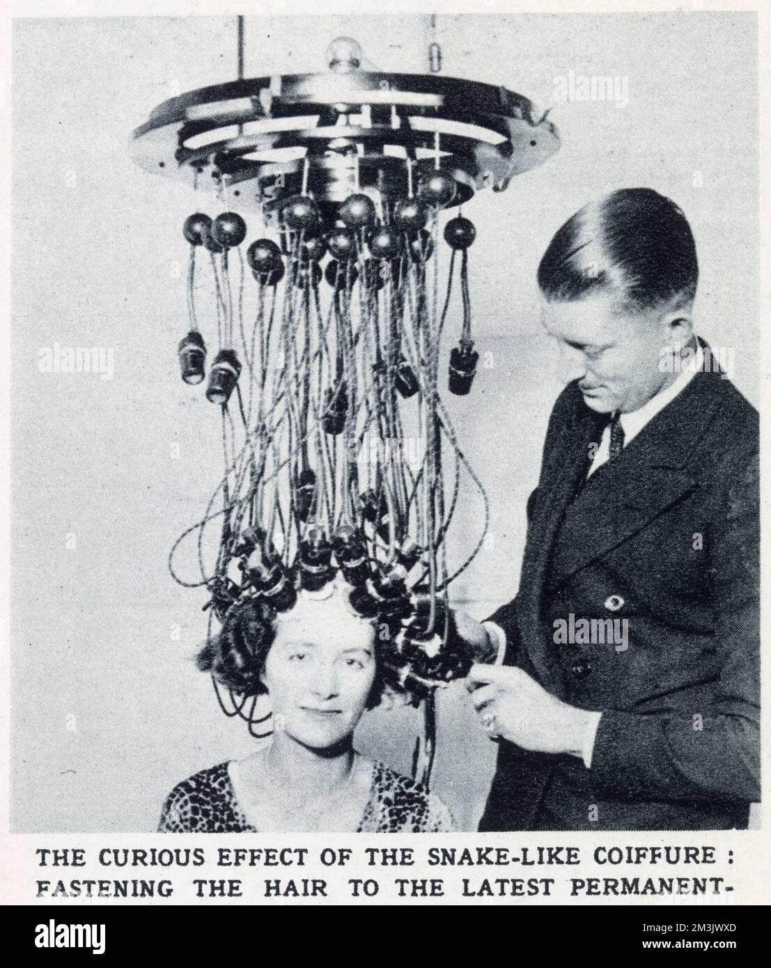 Curls are attached by the flex to the chandelierlike electrical machine. This device was