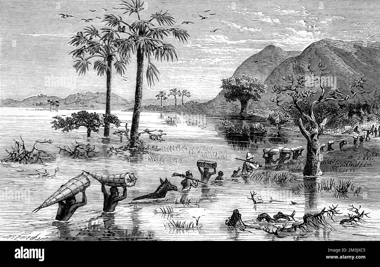 Sir Henry Morton Stanley's expedition crossing the Makata swamp in Central Africa, 1871.   In October 1869, Stanley (1841-1904) was sent by James Gordon Bennett (owner of the New York Herald) to find Dr. David Livingstone, who had been exploring central Africa for several years without passing any communication to Europe. Two years later Stanley found Livingstone at Ujiji, Tanganika, and with it also fame and some fortune.   Stanley led several further expeditions to Africa, the last of these in 1886 to find and relieve Emin Pasha. In 1892 he took British citizenship and was Unionist MP for L Stock Photo