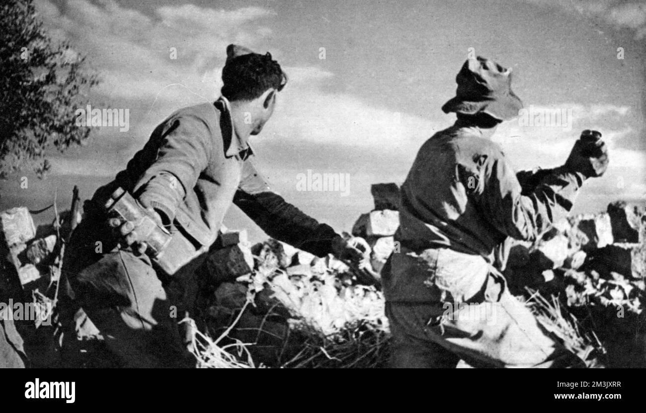 Photograph showing two Nationalist soldiers about to throw grenades at
