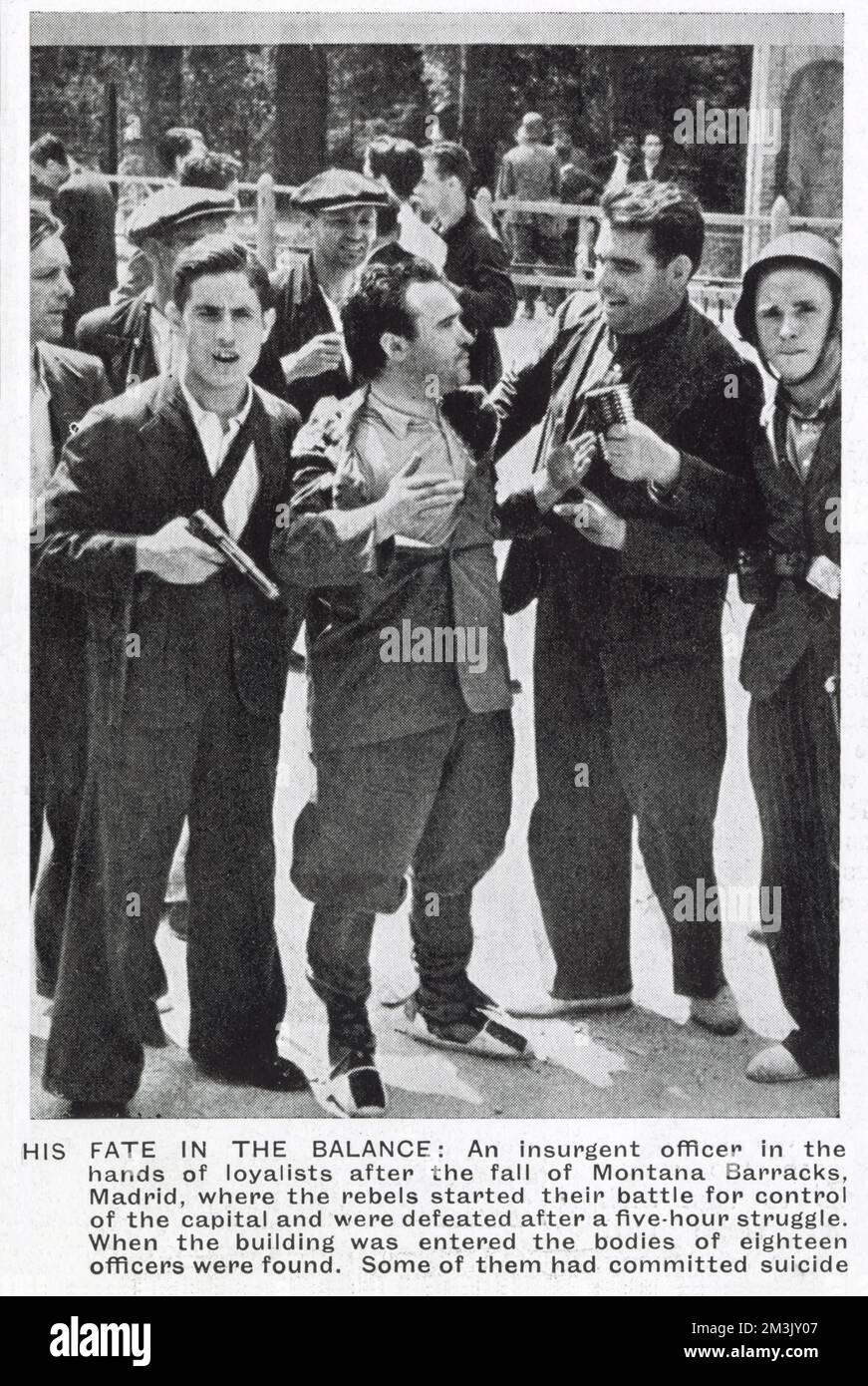 Nationalist officer (centre), from the Montana Barracks in Madrid, captured by Republican irregular troops, Madrid, 1936.   The forces of the Montana Barracks had risen in rebellion at the same time as the rest of the Nationalists, but had been quickly surrounded by Republicans and were forced to surrender after five hours of fighting. Stock Photo