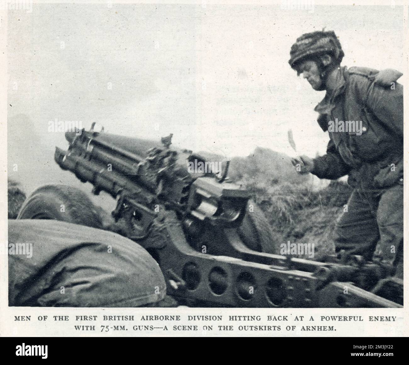 A soldier of the British First Airborne Division firing a 75mm gun at an enemy position near Arnhem, September 1944.  On 17th September 1944 Operation 'Market Garden' was put into action; a bold plan devised by Field-Marshal Montgomery to drop thousands of airborne troops into Holland to capture an invasion route into Germany. The British First Airborne, American 81st and 101st Divisions took part in the plan, which was ultimately unsuccessful. Stock Photo
