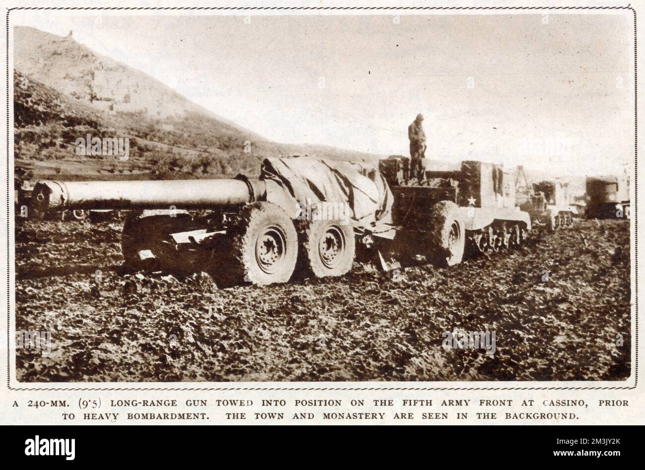 Photograph showing a 240mm long range gun being towed into position on the Allied Fifth Army front near Cassino, February 1944.  Between January and May 1944 the town of Cassino and Benedictine monastery of Monte Cassino were completely destroyed as the Allied Fifth Army attempted to push the occupying Nazi troops out of their strong defensive position in the area. Stock Photo