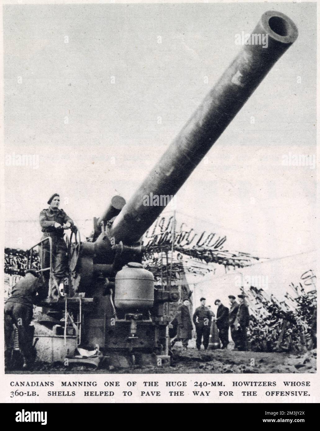 A unit of Canadian troops manning a 240mm howitzer, near the Reichswald area, Germany, February 1945.  This heavy artillery gun was firing 360-lb shells in support of a British and Canadian offensive, against the Nazi forces in Reichswald. Stock Photo