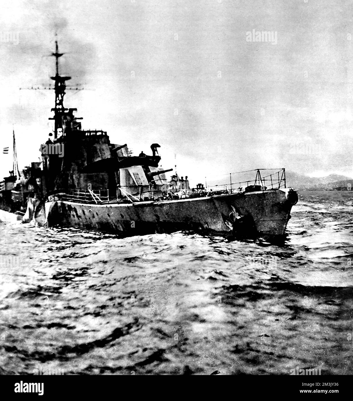 The damaged HMS 'Saumarez', pictured off the coast of Albania, after she had hit a mine, October 1946.   On the night of 22nd October the British destroyers HMS 'Saumarez' and 'Volage' hit mines in the channel between Corfu and Albania, sustaining heavy damage and casualties.     Date: 1946 Stock Photo