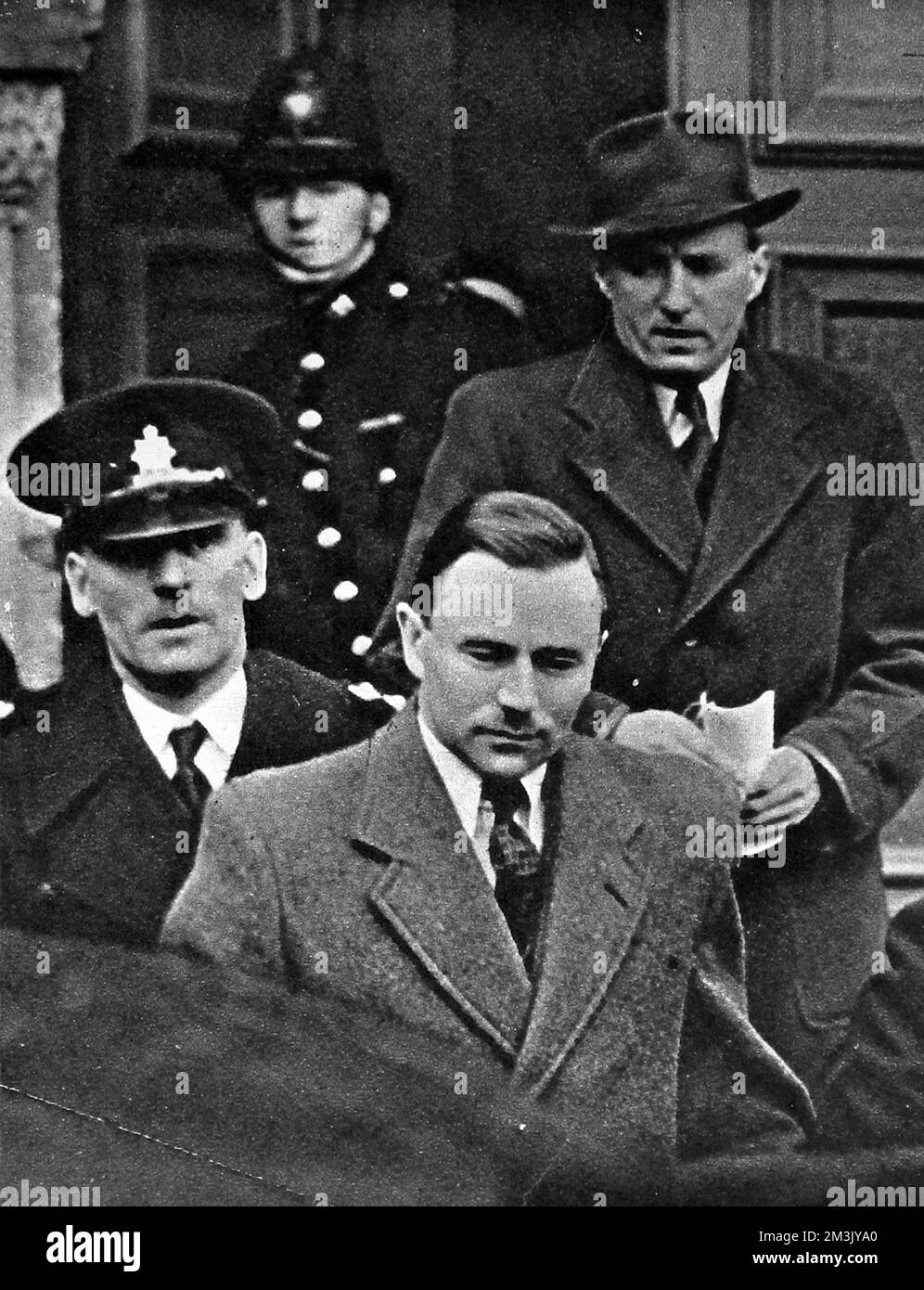 On the 2nd of March 1940 Mr George Haigh was charged with the murder of Mrs Olive Henrietta Durand-Deacon.     Searches were made by police of the Hurstlea Products factory at Crawley where Haigh was company director. A carboy that had once contained sulphuric acid was discovered, which was possibly used to destroy a human body. Mr Haigh's London home was also examined, with items removed for evidence.     Date: 1949 Stock Photo