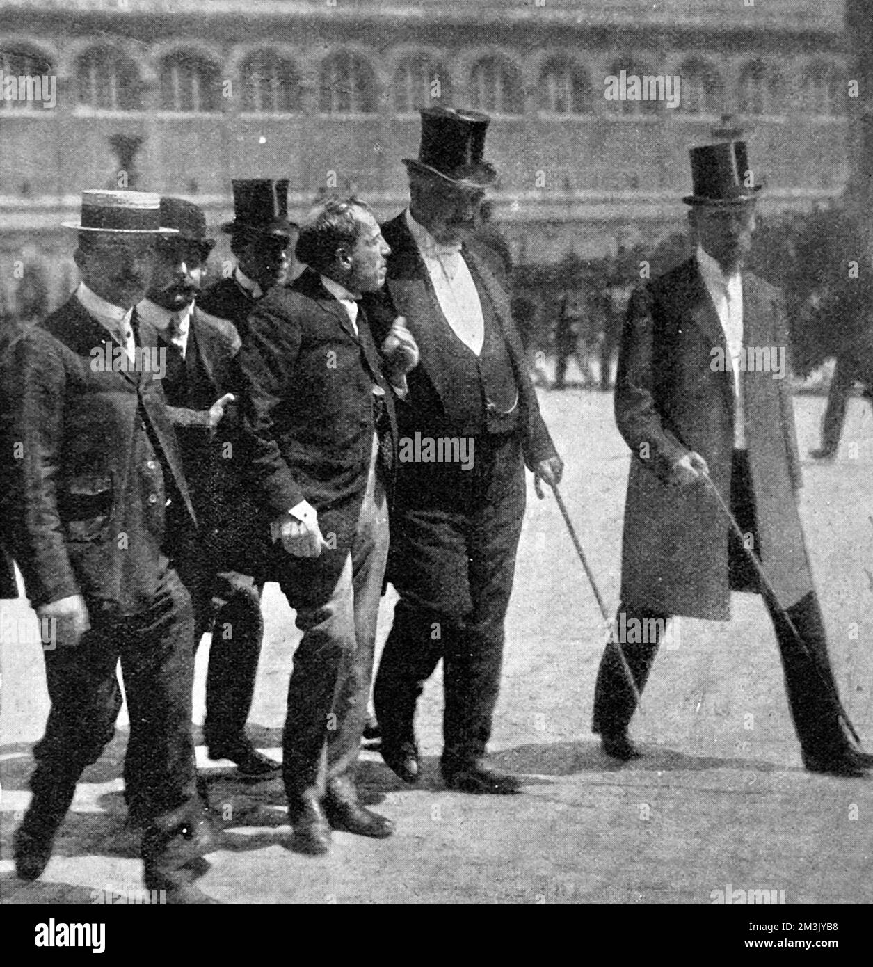 M. Gregory after his attack on Major Dreyfus during Zola's national burial at the Pantheon. Alfred Dreyfus was a French soldier who in 1894 was accused of handing over confidential documents linked regarding national defence to a foreign government. Dreyfus faced life imprisonment but supporters of his innocence managed to obtain a retrial and during this it was discovered that the documents used in the first trial were forgeries.  Dreyfus was found guilty for a second time, but he was pardoned for his crime. He gained his status in the French army and went on to serve in World War One, and w Stock Photo