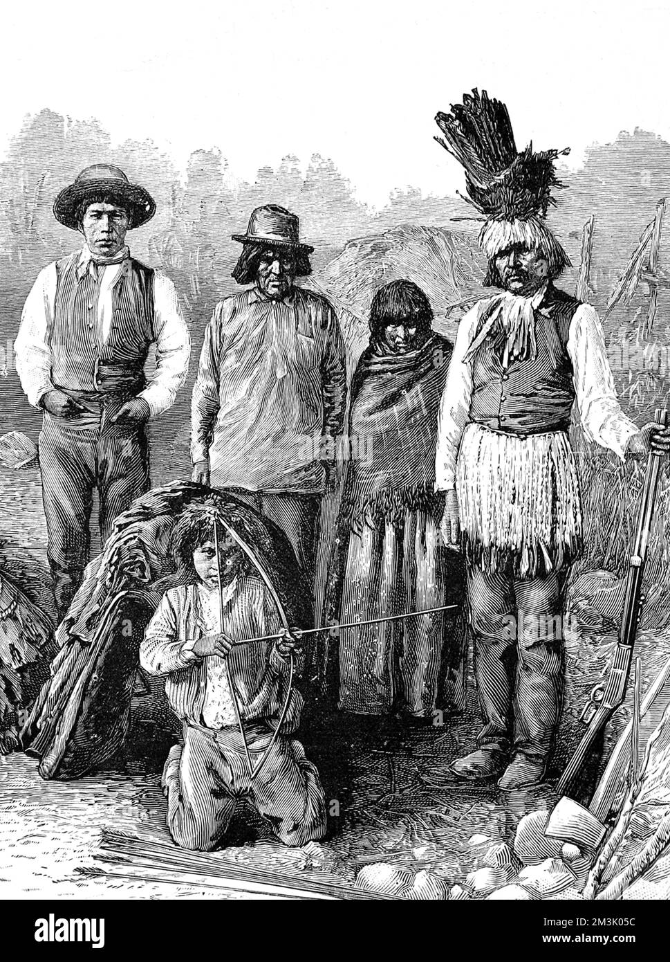 Group of American Indians in a mixture of traditional and European dress, boy in foreground  holding a bow and arrow, on the right the Chief in feathered head dress holding a rifle. Many Indian tribles were banding together under Sioux Chief Sitting Bull to fight against being forced into reservations.     Date: 1890 Stock Photo