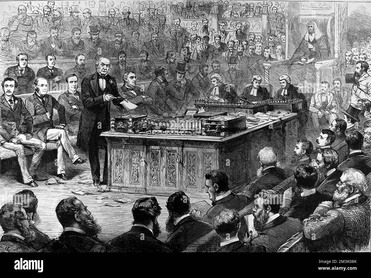 William Ewart Gladstone (1809 - 1898), English Liberal statesman (centre left), addressing the House of Commons during a debate on Irish Home Rule. Gladstone twice tried to introduce a Home Rule Bill for Ireland, but was defeated once in the Commons and once in the Lords.     Date: 8th April 1886 Stock Photo