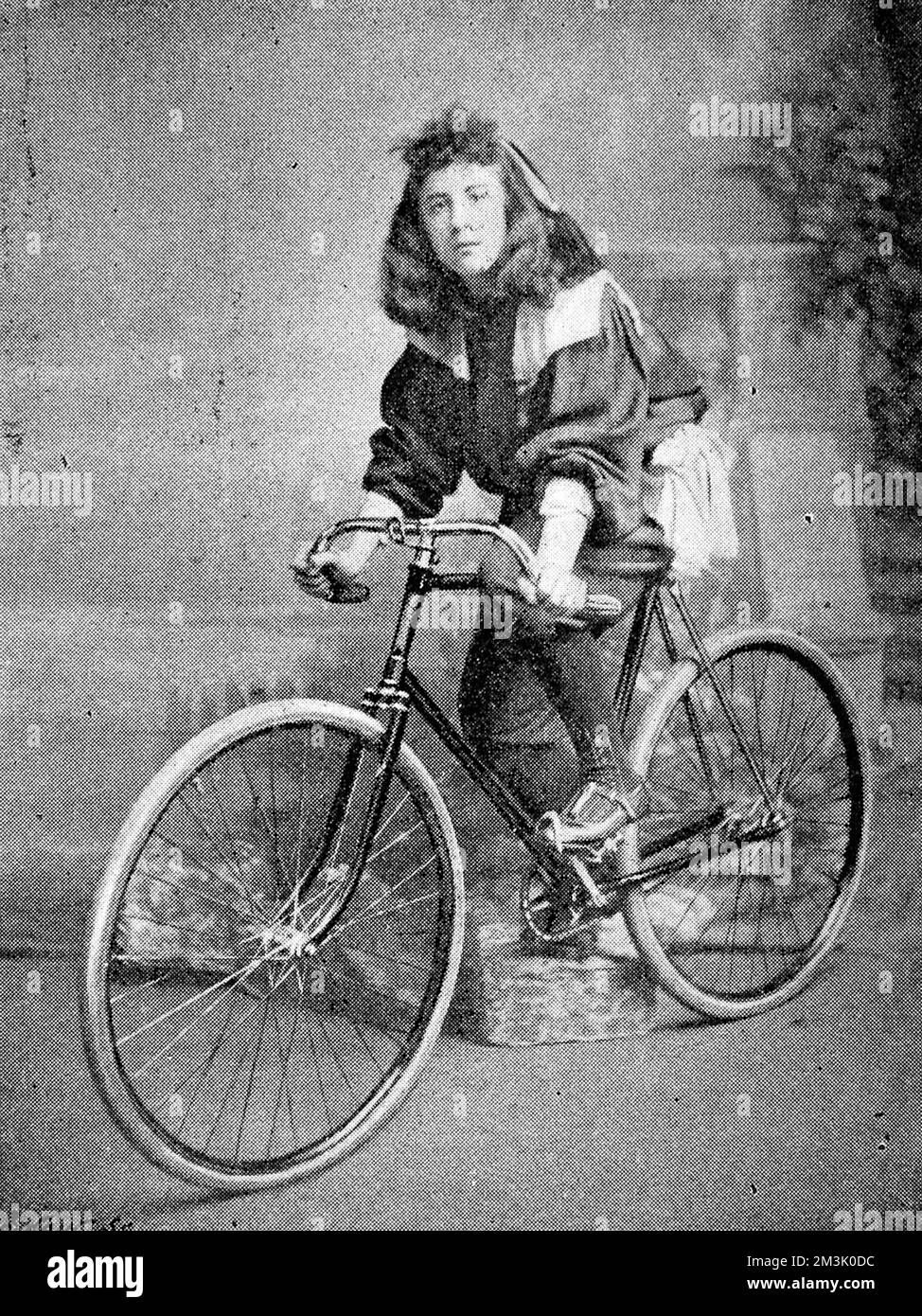 Nellie (Ellen) Hutton, the youngest member of the English team, at the first professional all female cycling tournament. Held at the Royal Aquarium, Westminster, London, a major entertainment and sports venue, at the time. It was a Six day event between England and France on a huge temporary wooden velodrome in the main hall. The competition was a great success, drawing in crowds with England winning. Stock Photo