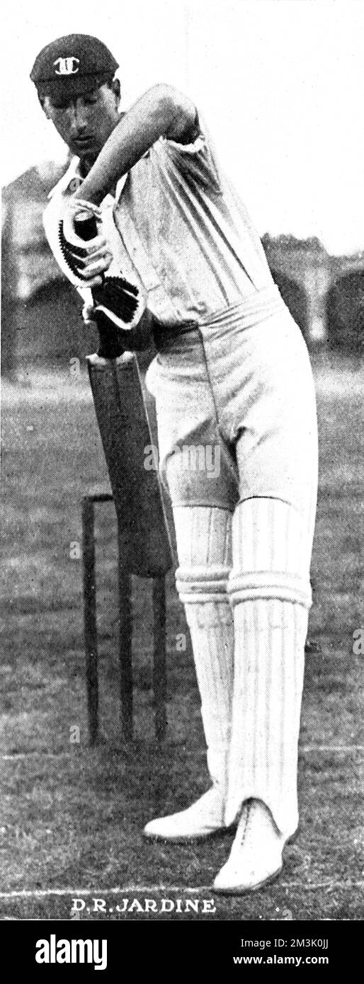 Douglas Jardine (1900 - 1958) batting for Oxford University in 1923.   Jardine went on to play for Surrey, MCC and England, captaining the MCC during their controversial 'Bodyline' tour of Australia in 1933.     Date: 1923 Stock Photo