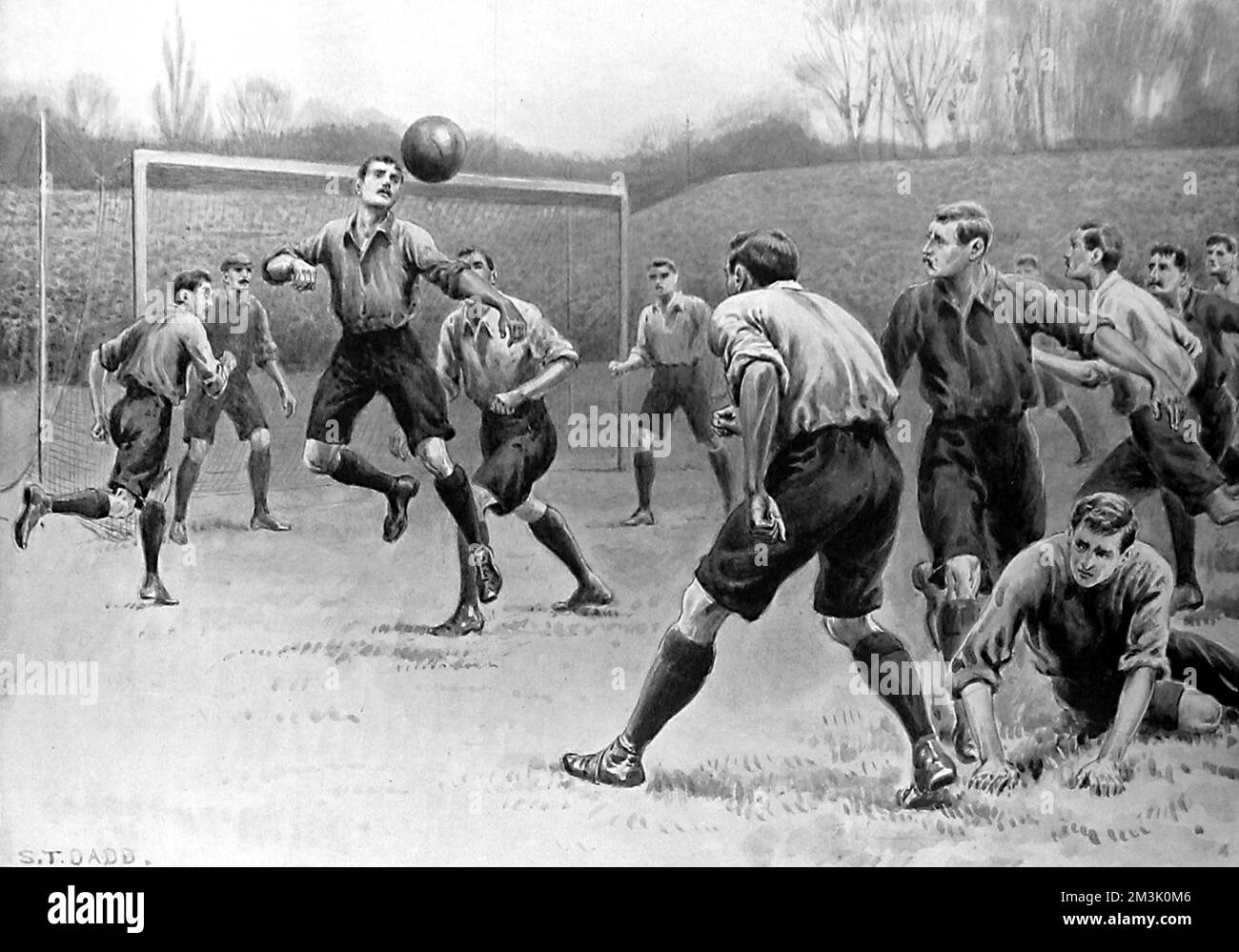 Derby County defender heading the ball clear, as Bury attack during the F.A. Cup Final, 18th April 1903.   This match was played at the Crystal Palace stadium and resulted in Bury winning 6-0. Such a win was not entirely expected given that Derby had won their previous meeting, only 3 months beforehand, 2-0.  1903 Stock Photo