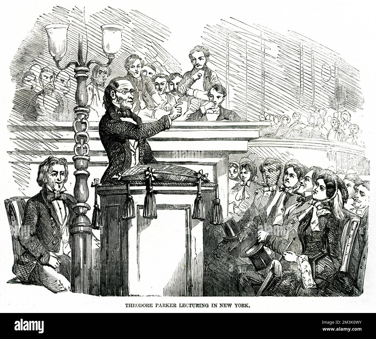 Theodore Parker (1810 - 1860), the famous Unitarian Minister, lecturer, scholar, writer and committed abolitionist. He is depicted lecturing an audience in New York on slavery and abolition.     Date: 1856 Stock Photo