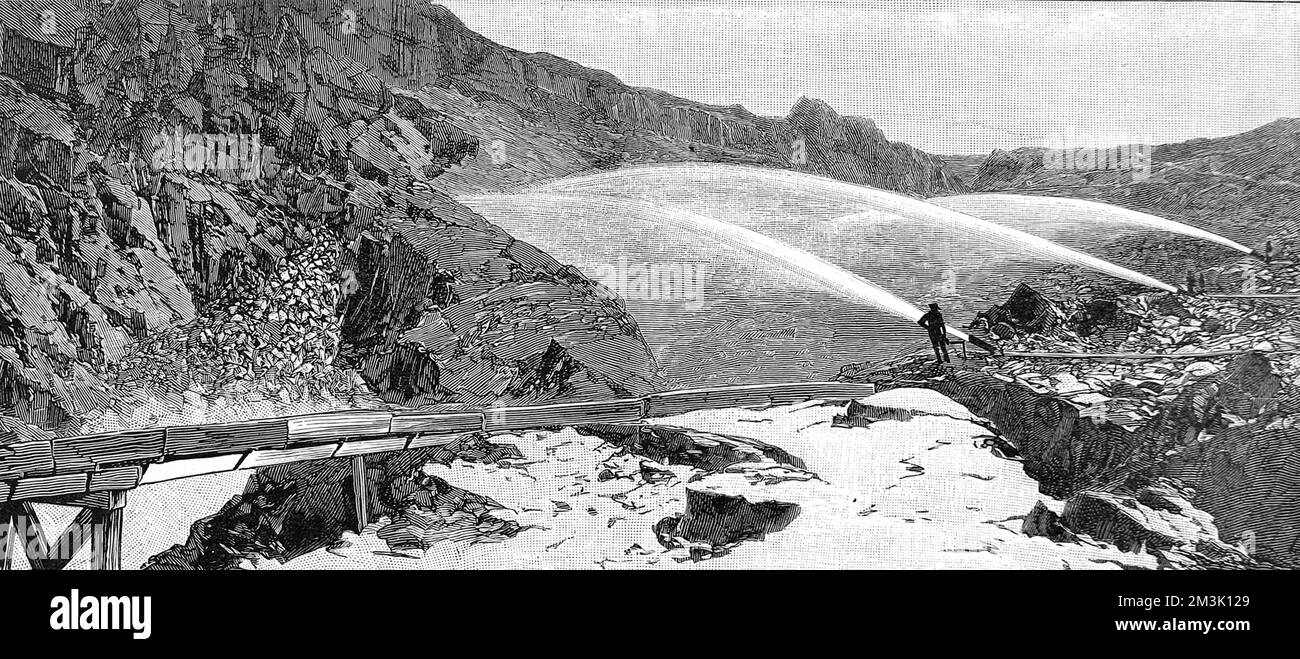 A gold mining operation using water cannon to destroy a mountain side