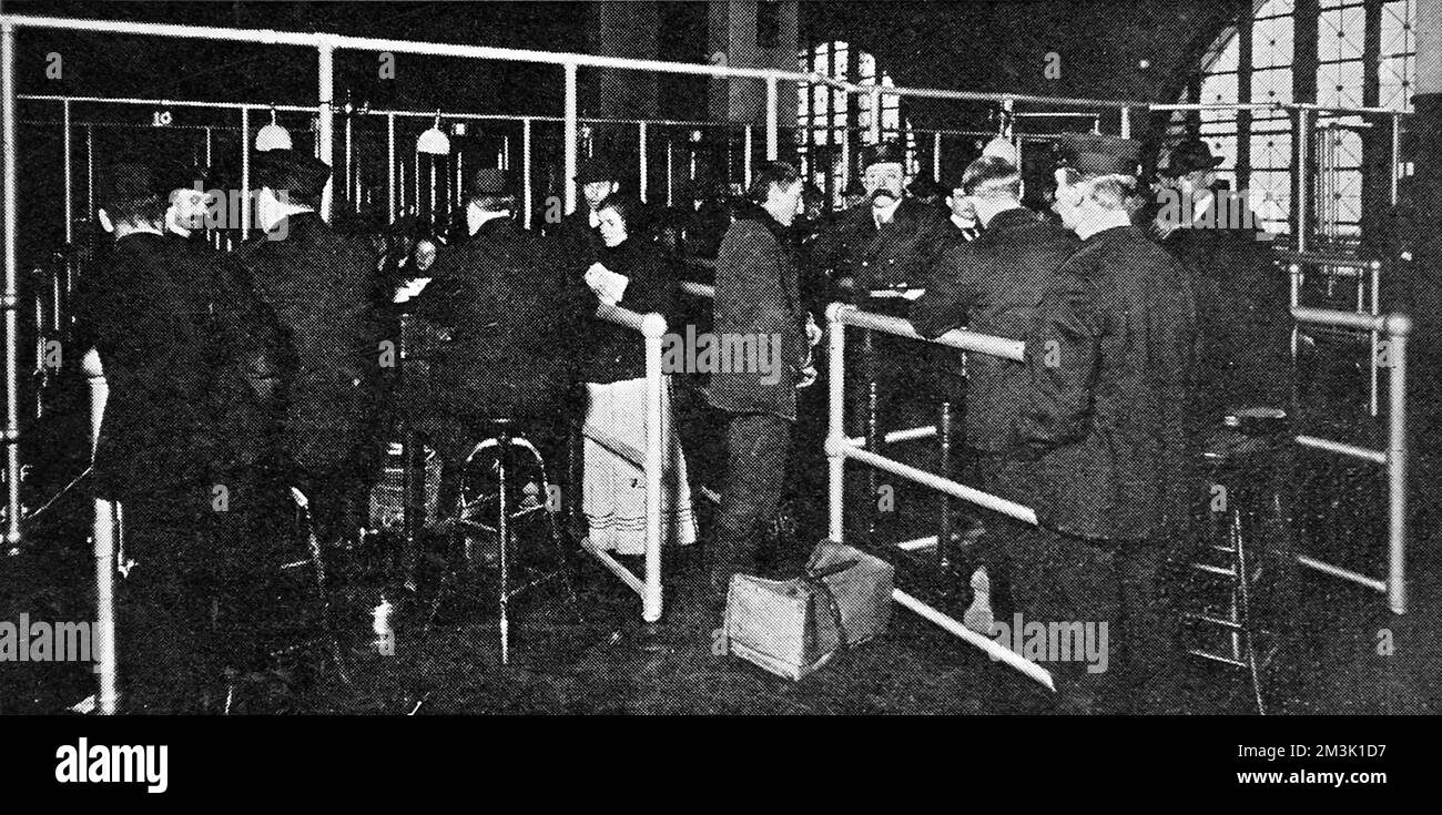 Examining Passports at Ellis Island, New York, 1911 Stock Photo - Alamy