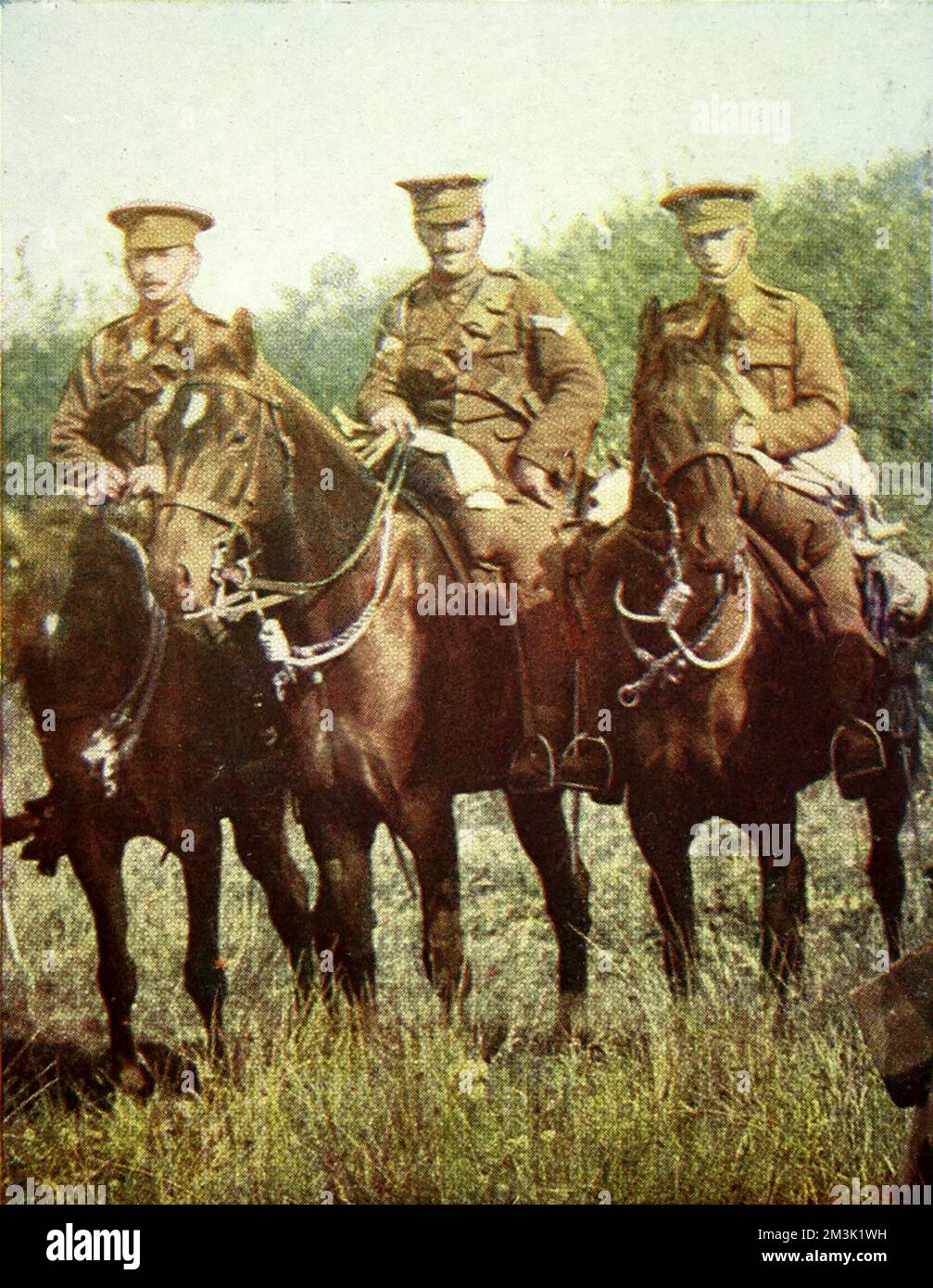 Dragoon guards of the Queen's Bays mounted during an exercise. The colour image was published by the Illustrated London News to show their readers how the British khaki uniforms appeared against a European landscape.     Date: 1916 Stock Photo