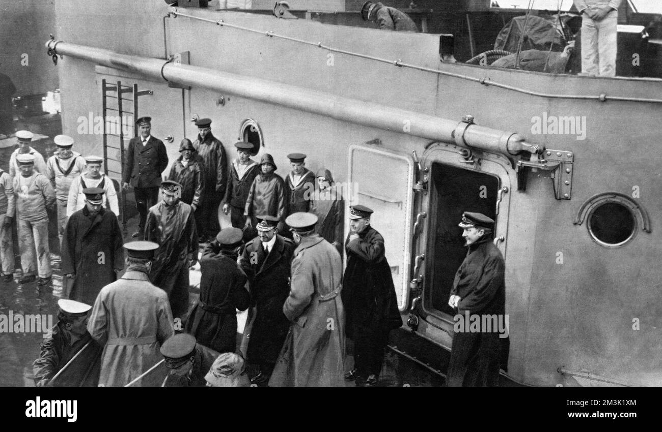 A photograph of Admiral John Rushworth Jellicoe (1859-1935) bidding farewell to Field-Marshal Horatio Herbert Kitchener (1850-1916) before his embarkation aboard the H.M.S. Hampshire, bound for Russia. Kitchener (third figure from right) was made Secretary of State for War in 1914 and was drowned when the Hampshire struck a mine off Orkney and sank on the 5th June 1916. Admiral Jellicoe is seen standing beside Kitchener, shaking hands with Hugh James O'Beirne of the Foreign Office, who also perished in the sinking. Jellicoe was appointed Command-in-Chief of the Grand Fleet in 1914 and was prom Stock Photo