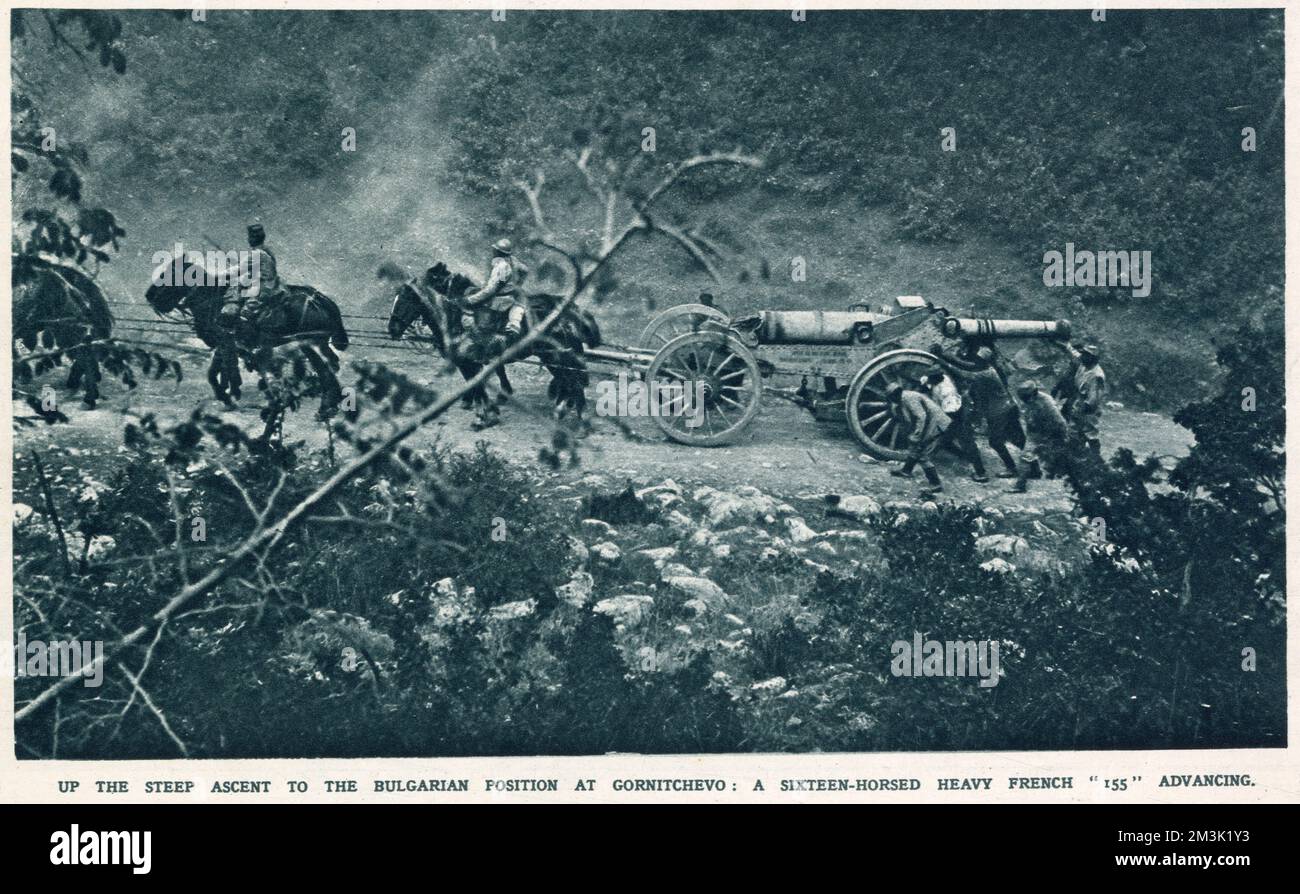 A French heavy-gun battery move up a steep hill during fighting with the Bulgarian army on the Macedonian border, October 1916. The battery was part of the Allied army based at the Greek port of Salonika and required a team of sixteen horses to move the weapon up the sharp incline pictured. Stock Photo