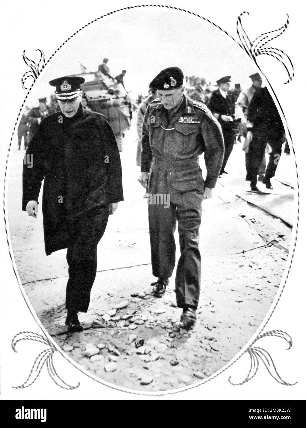 King George VI (on left) and General Montgomery walking on one of the Normandy beaches, 16th June 1944.   Although the Allied armies had only invaded Normandy on 6th June that year, they felt secure enough in their bridgehead to have King George pay a surprise visit on the 16th.     Date: 1944 Stock Photo