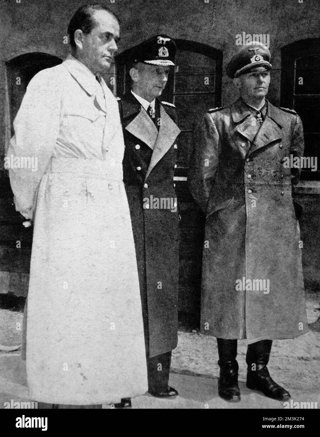 Photograph showing Dr. Albert Speer (1905-1981), Grand-Admiral Karl Doenitz (1891-1980) and Colonel-General Alfred Jodl (1890-1946), at the end of the Second World War in Europe, May 1945.     Date: 1945 Stock Photo