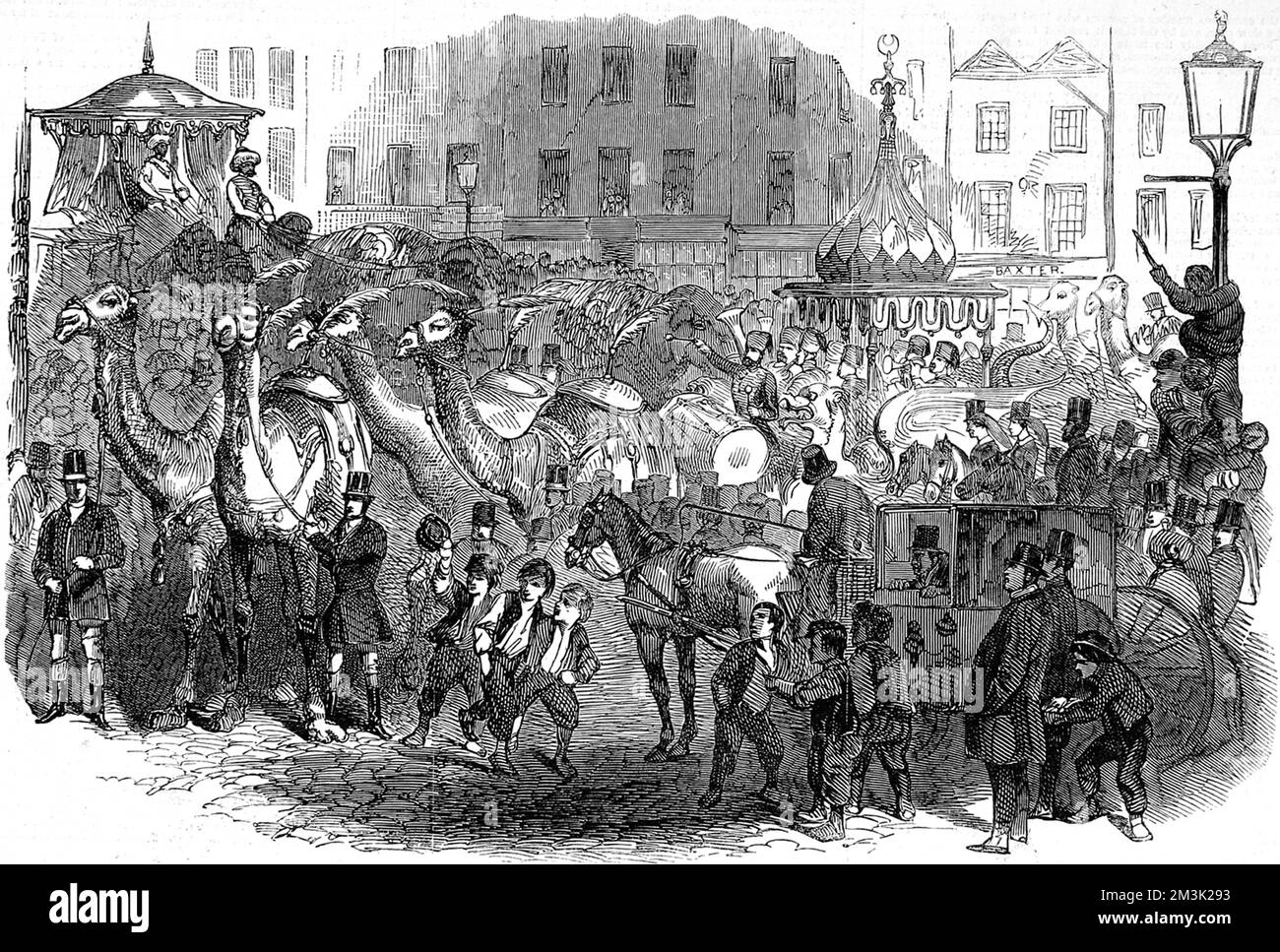 Hughes' 'Mammoth Troupe' moving through the streets of London on their
