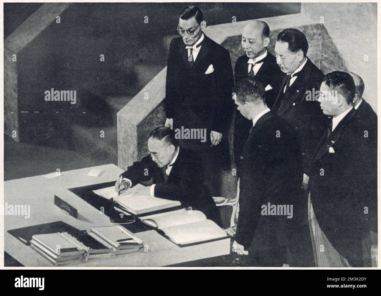 Shigeru Yoshida, the Japanese Premier, signing the Peace Treaty at San Francisco, 4th September 1951. This treaty, signed by 48 other countries of the United Nations, returned Japan her sovereign status, six years after the end of the Second World War.     Date: 1951 Stock Photo