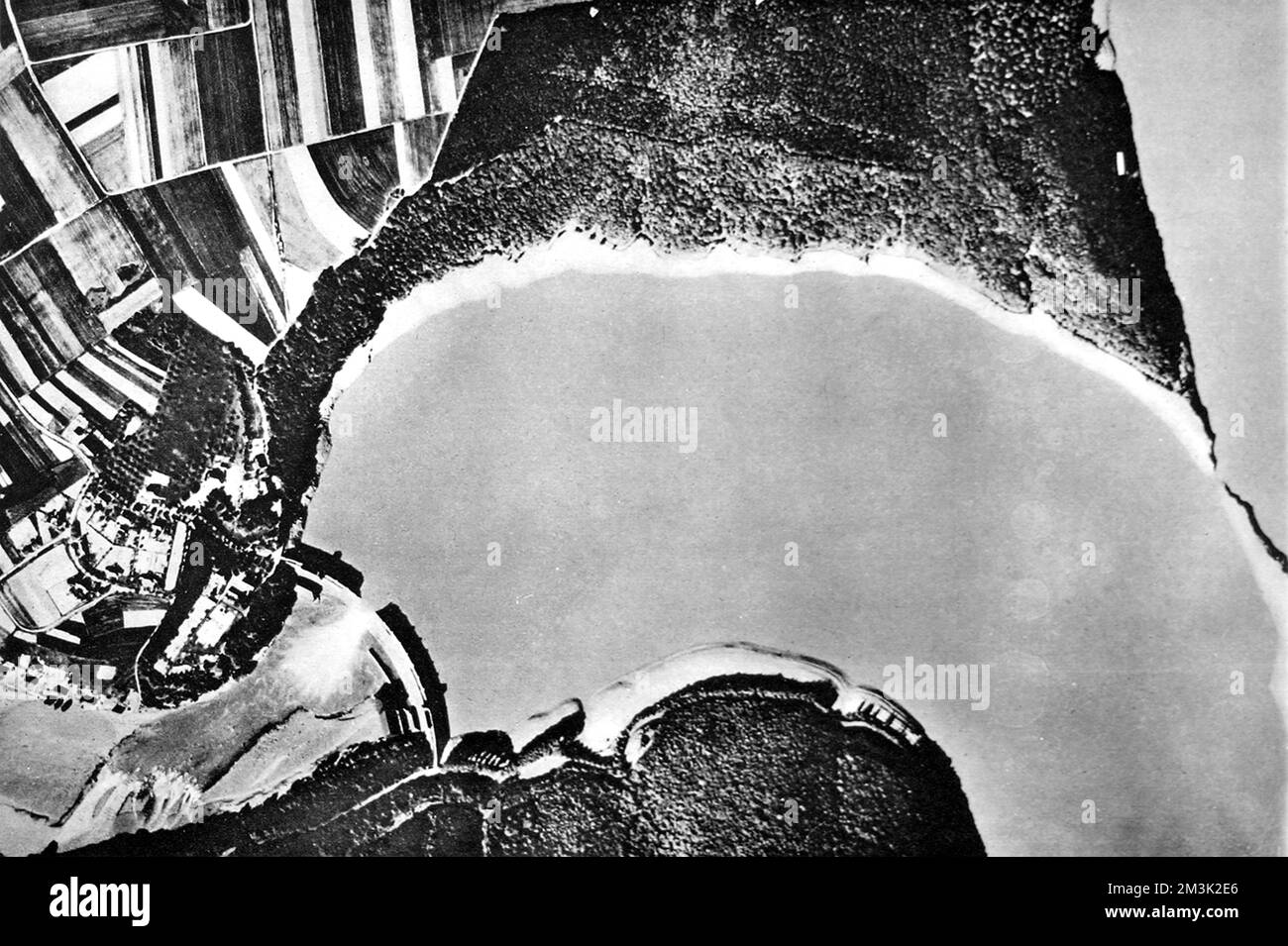 Aerial photograph showing the Eder Dam and reservoir after it had been breached by the RAF 'Lancaster' bombers of 617 Squadron during the 'Dambuster' Raid of 16 May 1943.     Date: 1943 Stock Photo