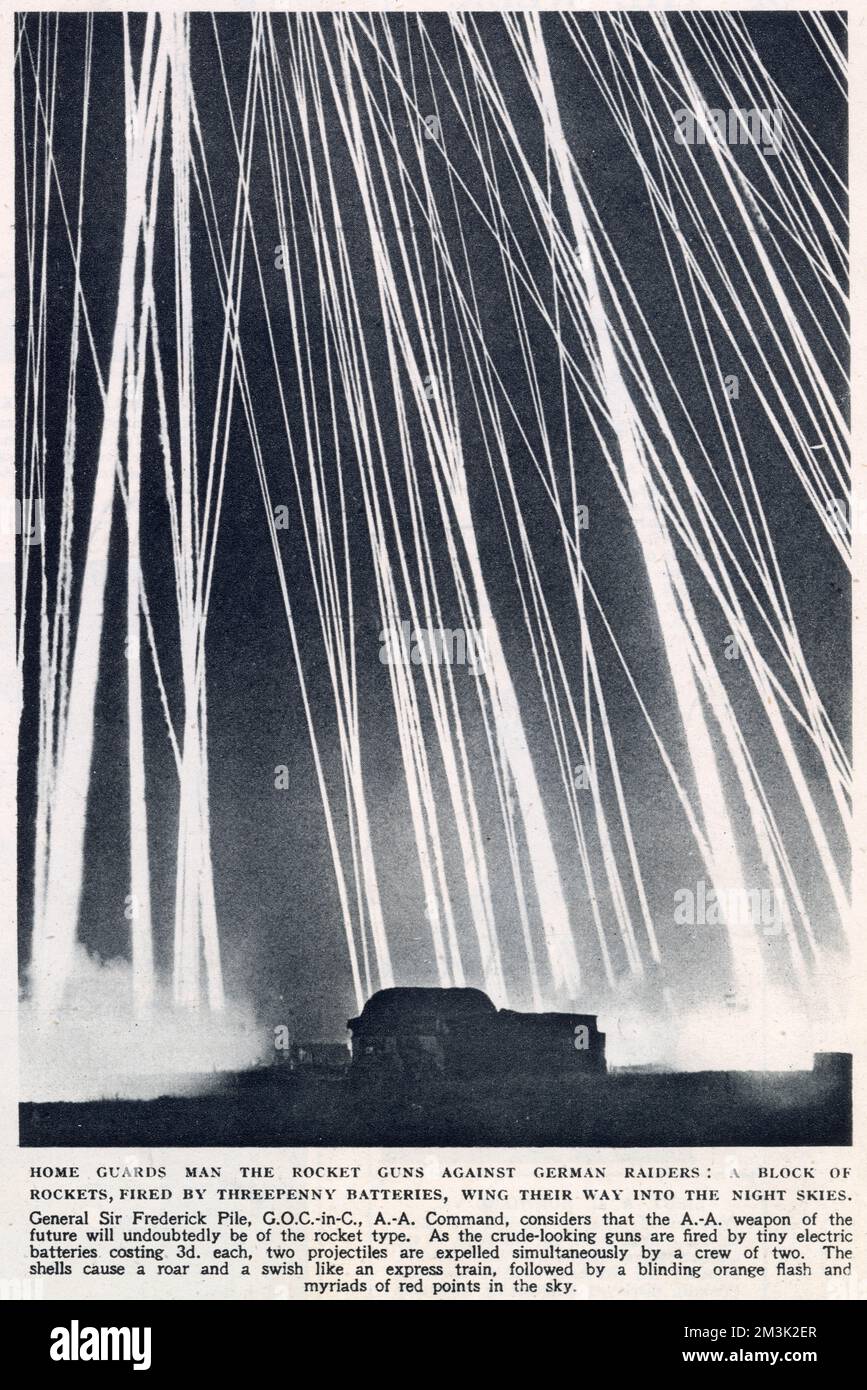 The firing of anti-aircraft rockets at night, by British Home Guard units against German raiders. Stock Photo