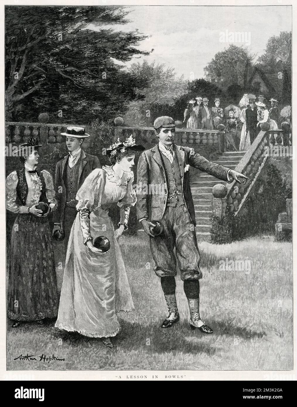 Two young couples enjoying a game of bowls on the lawn of an English country house. Stock Photo