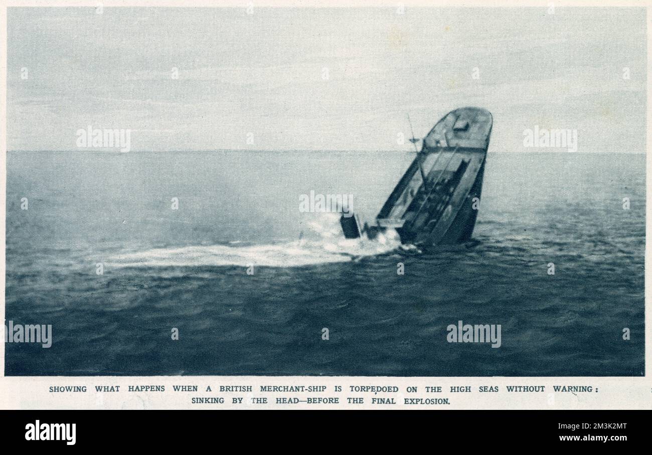 A sinking British Merchant ship, after she had been torpedoed by a German submarine, 1916.   In this picture the ships funnel has reached the waterline and the stern is lifted into the air as she sinks, bows first. Stock Photo