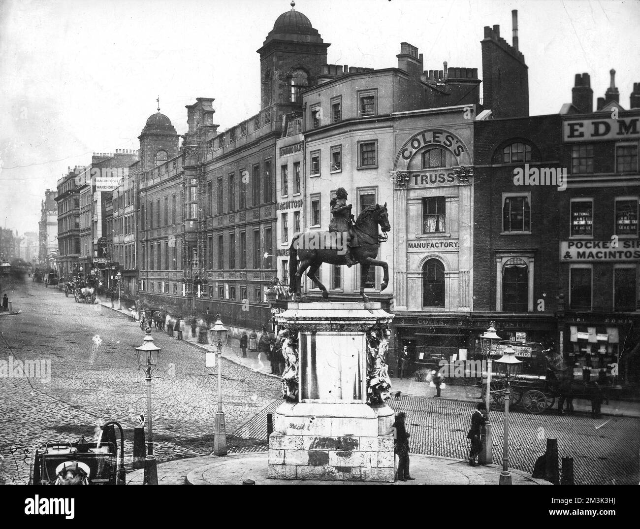 Photograph showing Charing Cross, London, c.1880.      The photographer used an exposure of sufficient length to blur some of the moving vehicles and pedestrians, but retain the stationary ones perfectly.     Date: c.1880 Stock Photo