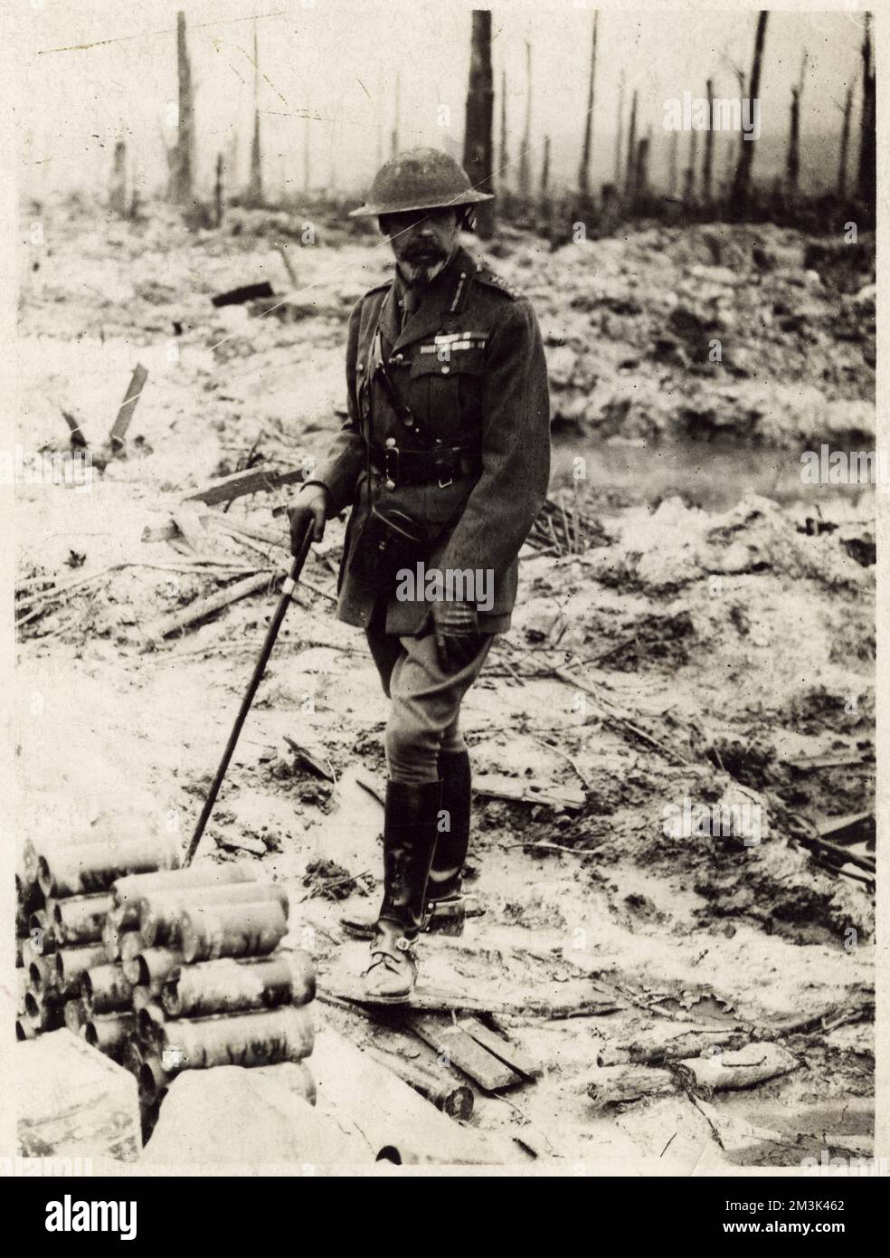 George V, King of Britain (1865 - 1936), pictured in Field-Marchal's service uniform and steel helmet on a visit to the Western Front at the devasteted battleground at Wytschaete ridge, during the First World War, landing in France on 3 July, the King spent the following day with General Sir Herbert Plumer's Army Stock Photo