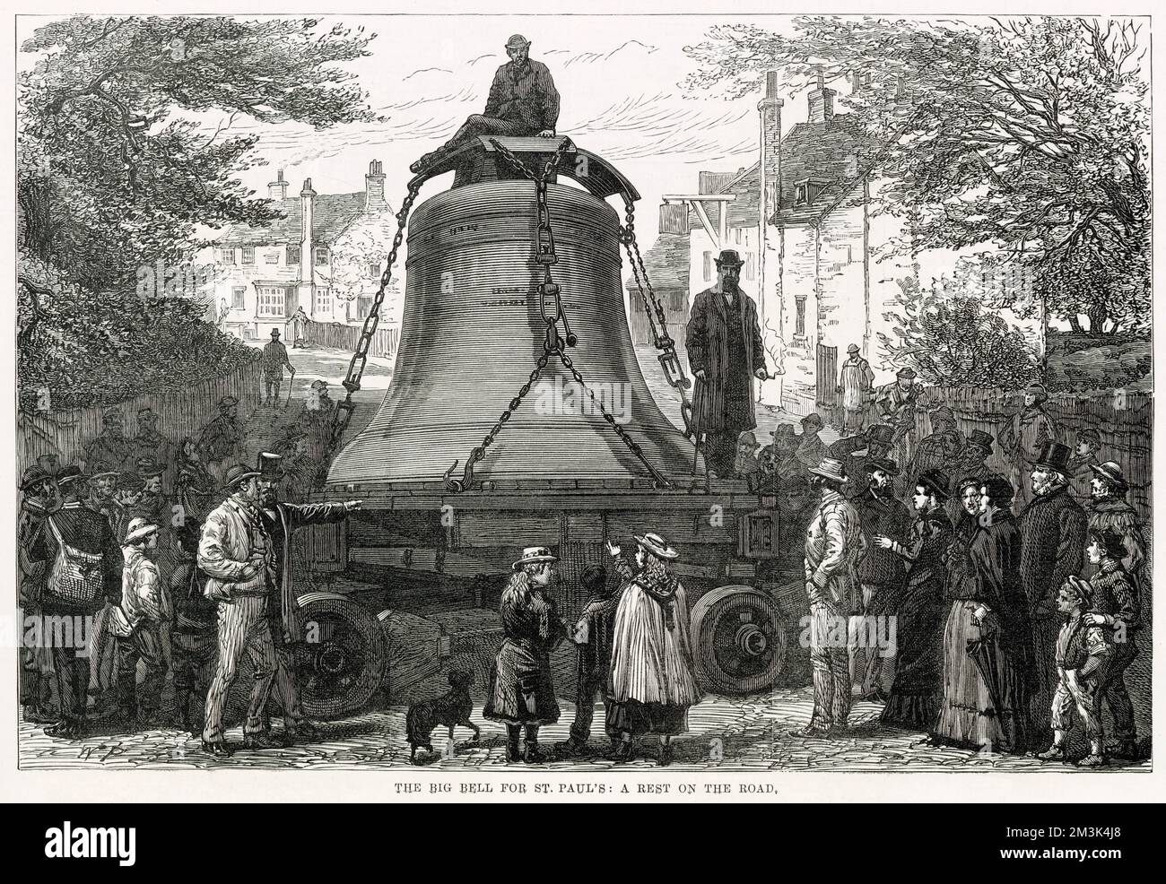 The Great Bell of St. Paul's Cathedral being transported by traction engine from Loughborough to London. The scene as the engine was given a rest in a small town and the bell quickly drew a crowd of local admirers. Stock Photo