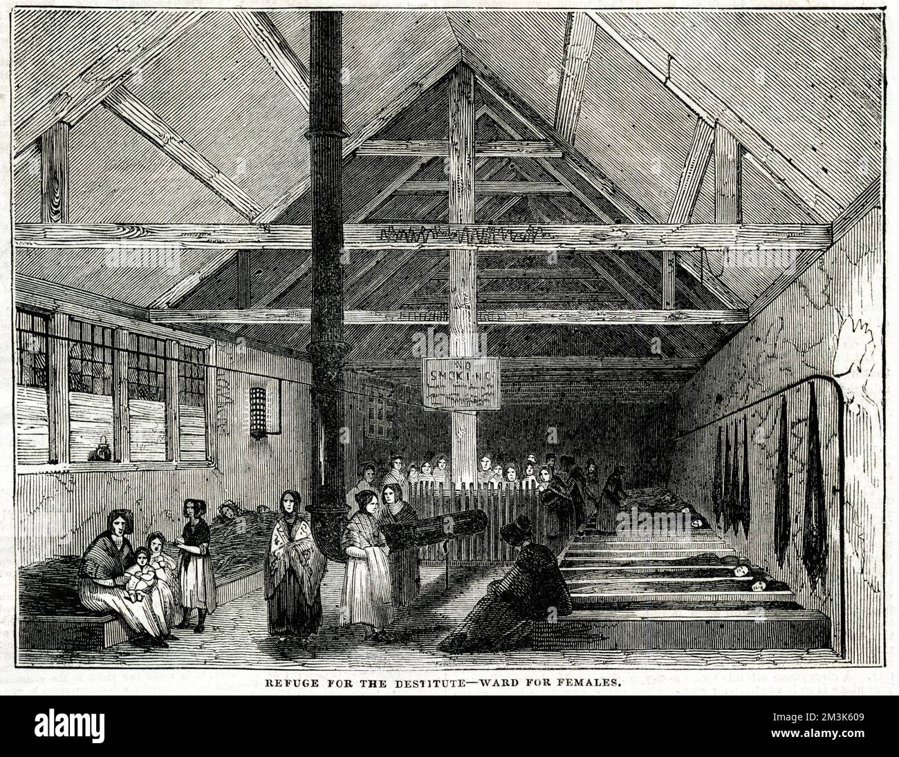 This refuge for the destitute and homeless was situated in the Playhouse Yard, Whitecross Street. This is the ward for females with coffin like boxes for beds. The refuge consisted of three rooms, lit with gas and some smaller rooms. The men and women slept in separate rooms, or wards with children staying in the women's ward. 650 people could be accomodated here. There was a prominent - No Smoking - sign displayed in both male and female wards. People slept in their clothes and in the morning would receive half a pound of bread before having to leave. On Sundays, they received cheese as well Stock Photo