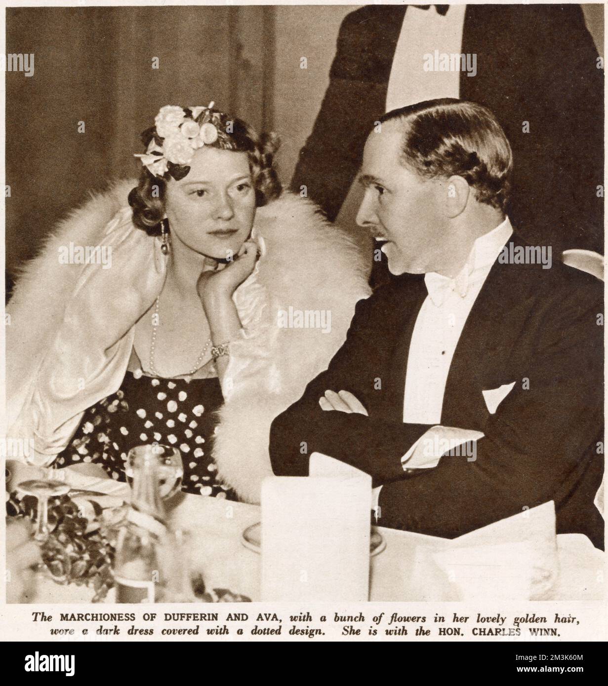 Marchioness of Dufferin and Ava talking the the Hon. Charles Winn at the Primrose League Ball. Stock Photo