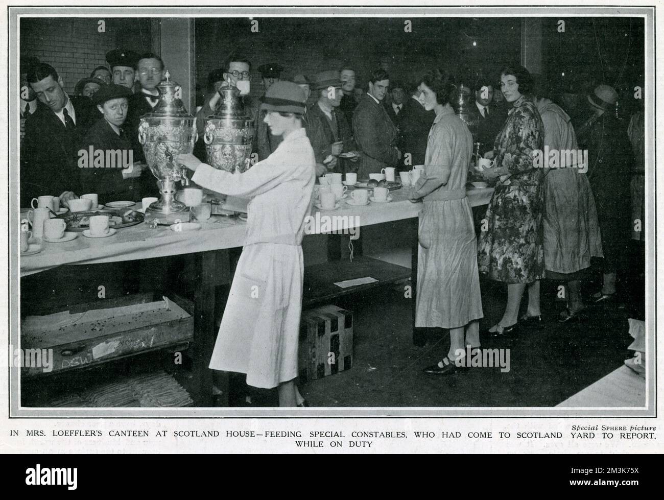 In Mrs Loeffler's canteen at Scotland House. Lady volunteers, including Lady Louis Mountbatten, feeding Special Constables, who had come to Scotland Yard to report, while on duty.  In support of a strike by coal miners over the issue of threatened wage cuts, the Trades Union Congress called a General Strike in early May 1926. The strike only involved certain key industrial sectors (docks, electricity, gas, railways) but, in the face of well-organised government emergency measures and lack of real public support, it collapsed after nine days.     Date: May 1926 Stock Photo