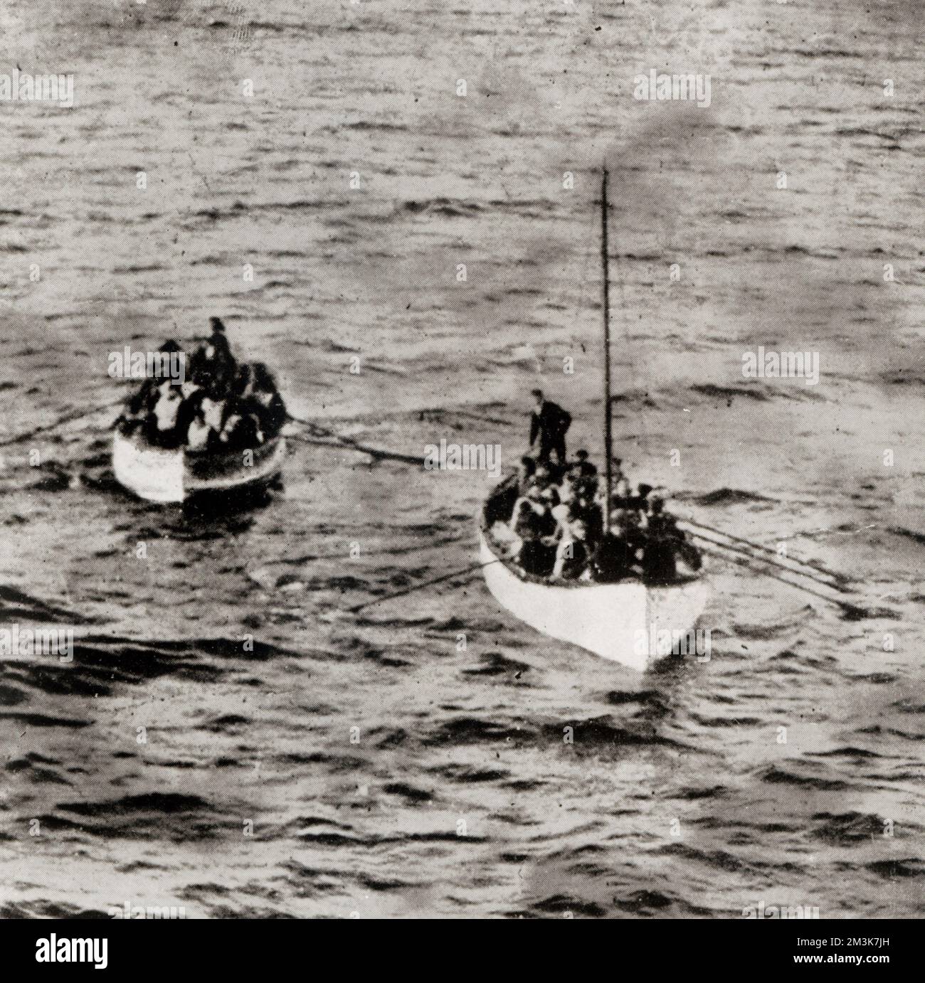 A photograph showing two lifeboats approaching the rescue ship Carpathia.     Date: 4th May 1912 Stock Photo