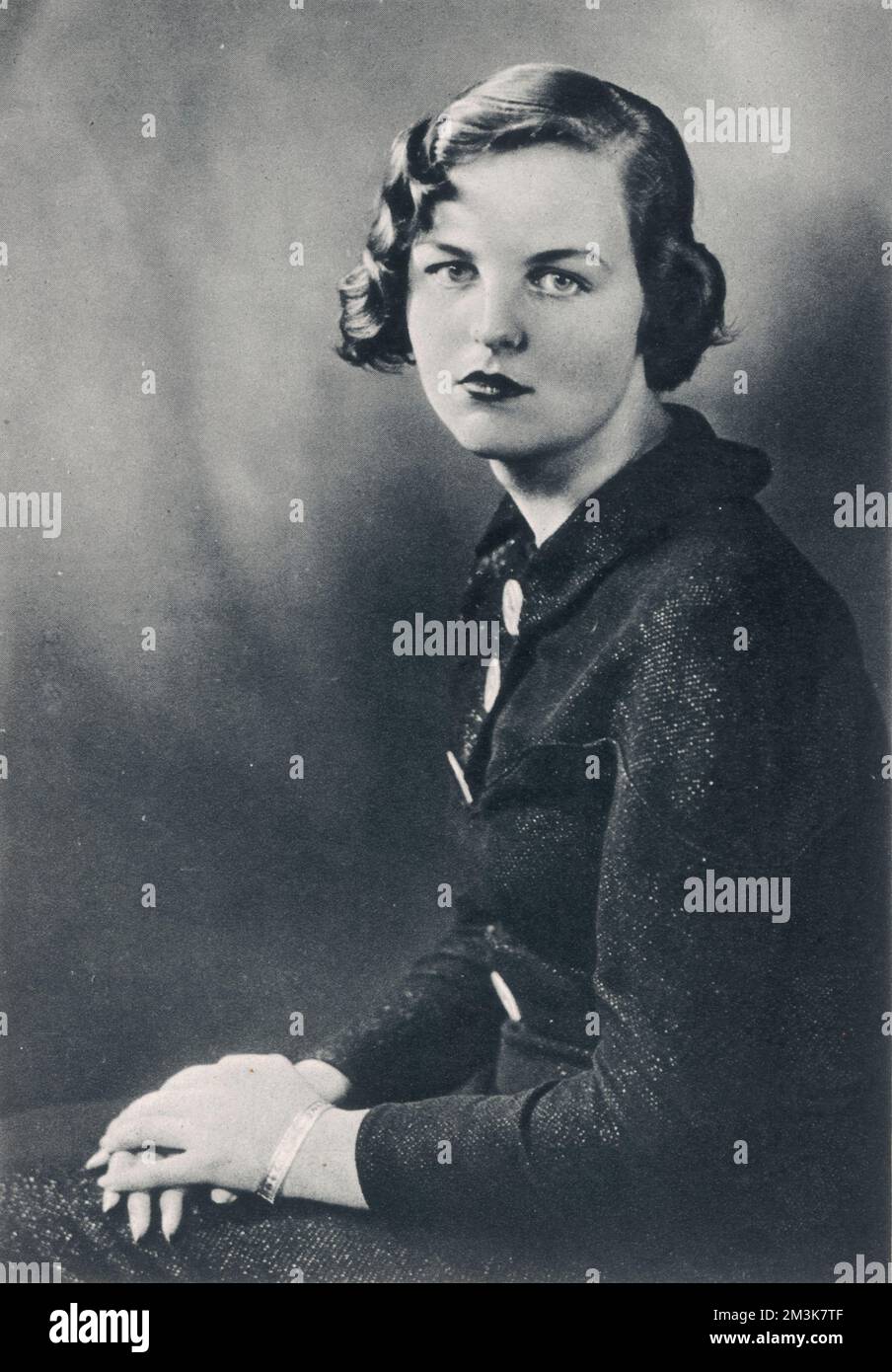 Photograph of Jessica Mitford, 5th daughter of Lord and Lady Redesdale.     When she was 19, Jessica Mitford eloped with Esmond Romilly, the nephew of Winston Churchill, to cover the Spanish Civil War. The couple emigrated to the USA in 1939. Esmond Romilly was killed in combat in 1941.     Jessica Mitford remained in America and through her interest in communism met American civil rights lawer Robert Edward Treuhaft, whom she married in 1943.  1937 Stock Photo
