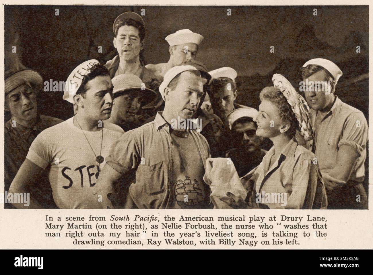 A scene from South Pacific, the American musical, at Drury Lane Theatre in 1952. Mary Martin (right) played Nellie Forbush, and is talking to the comedian Ray Walston, with Billy Nagy on his left.     Date: 1952 Stock Photo