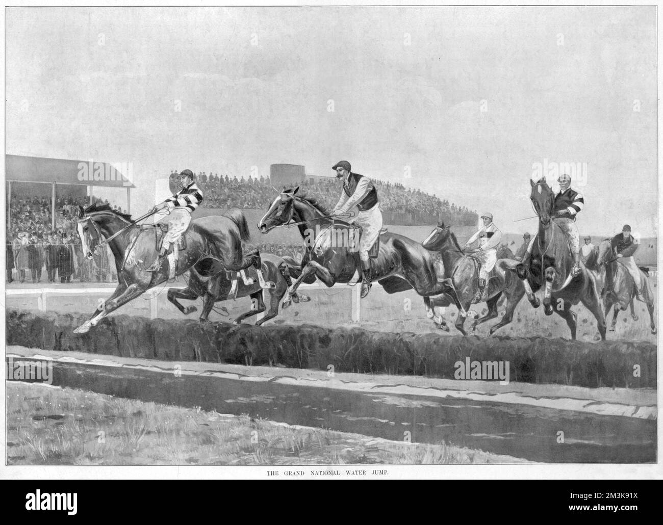 Horses and riders leap over  the water jump on the Grand  National course at Aintree in  1897.  The winner, Manifesto  is seen in the lead.      Date: 27 March 1897 Stock Photo