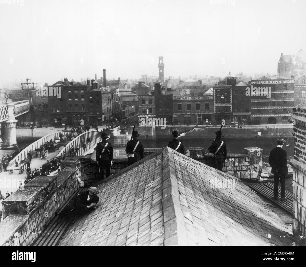 Irish Citizen Army soldiers stand guard on the roof of Liberty Hall in