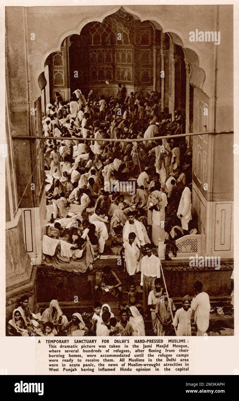A scene at the Jami Masjid Mosque where several hundreds of refugees, after fleeing from their burning homes, were accommodated until refugee camps were ready to receive them.  All Muslims in the Delhi area were in acute panic, the news of Muslim-wrought atrocities in the West Punjab having inflamed Hindu opinion in the capital.  One of the results of the widespread violence following Partition and the creation of modern India and Pakistan.  1947 Stock Photo